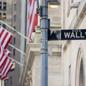 Wall Street dips as U.S.-China trade tensions reignite, bank earnings move markets