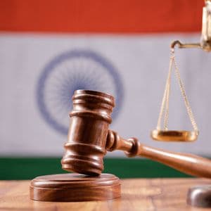 Former Indian Lawmaker, Police Officer Convicted in Bitcoin Extortion Case