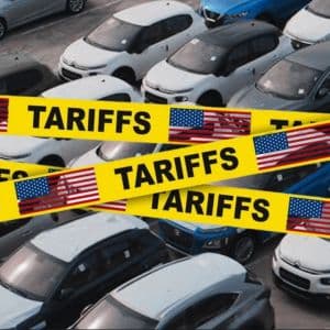 Western automakers face high costs, tariffs, competition, and strict carbon rules while shifting to EVs