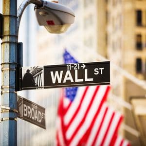 Wall Street ticks up as Powell takes a pass on policy outlook