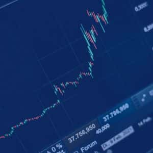 Markets trade mixed as stocks, dollar, Bitcoin, and gold react to rate cut