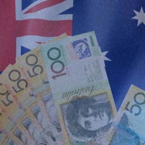 Australia's central bank governor puts economy on alert despite recent stability