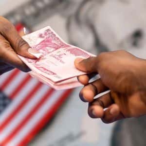 Nigeria’s dollar bonds, naira drops after Trump's military action, aid cutoff threats