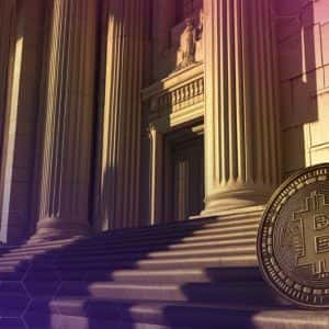 JPMorgan CEO Dimon Sees Inflation Blocking Fed Cuts, Says Stablecoins Pose No Bank Threat